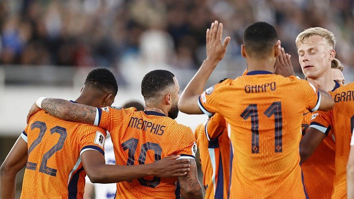 HELSINKI - (L-R) Denzel Dumfries of the Netherlands, Memphis Depay of the Netherlands, Cody Gakpo of the Netherlands, Jan Paul van Hecke of the Netherlands celebrate the 0-2 during the World Cup qualifier between Finland and the Netherlands at the Olympic Stadium on June 7, 2025 in Helsinki, Finland. ANP MAURICE VAN STEEN (Photo by ANP via Getty Images)
