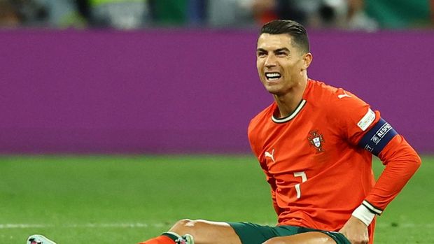 Soccer Football - Nations League - Final - Portugal v Spain - Allianz Arena, Munich, Germany - June 8, 2025 Portugal's Cristiano Ronaldo reacts in pain as he sits on the ground after sustaining an injury REUTERS/Kai Pfaffenbach