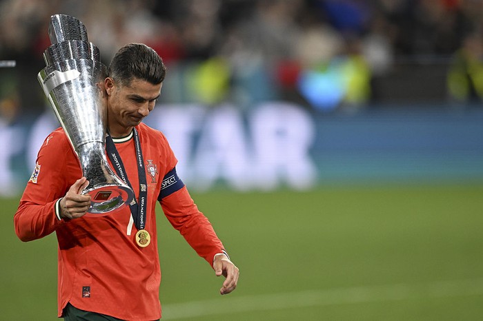 Cristiano Ronaldo MUNICH, GERMANY - JUNE 8: Cristiano Ronaldo of Portugal holds trophy after winning Spain during the UEFA Nations League 2025 final match between Portugal and Spain at the Allianz Arena on June 8, 2025 in Munich, Germany. (Photo by Halil Sagirkaya/Anadolu via Getty Images)