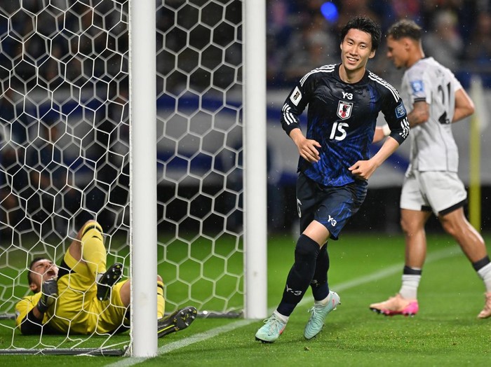 SUITA, JAPAN - JUNE 10: Daichi Kamada of Japan (C) celebrates after scoring the team's first goal during the FIFA World Cup Asian Third Qualifier Group C match between Japan and Indonesia at Panasonic Stadium Suita on June 10, 2025 in Suita, Osaka, Japan. (Photo by Kenta Harada/Getty Images)