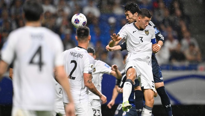  Daichi Kamada of Japan (C) celebrates after scoring the team's first goal during the FIFA World Cup Asian Third Qualifier Group C match between Japan and Indonesia at Panasonic Stadium Suita on June 10, 2025 in Suita, Osaka, Japan. (Photo by Kenta Harada/Getty Images)