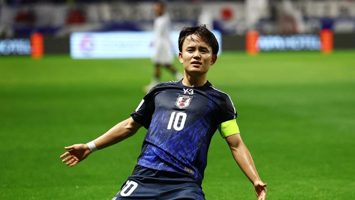 Soccer Football - World Cup - AFC Qualifiers - Group C - Japan v Indonesia - Suita City Stadium, Suita, Japan - June 10, 2025 Japans Takefusa Kubo celebrates scoring their second goal REUTERS/Issei Kato
