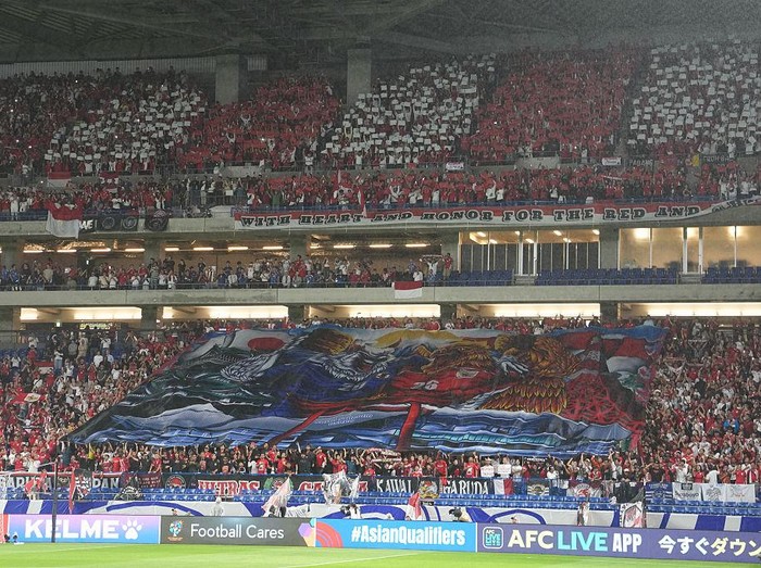 SUITA, JAPAN - JUNE 10: Supporters of Indonesia cheer during the FIFA World Cup Asian Third Qualifier Group C match between Japan and Indonesia at Panasonic Stadium Suita on June 10, 2025 in Suita, Osaka, Japan. (Photo by Masashi Hara/Getty Images)