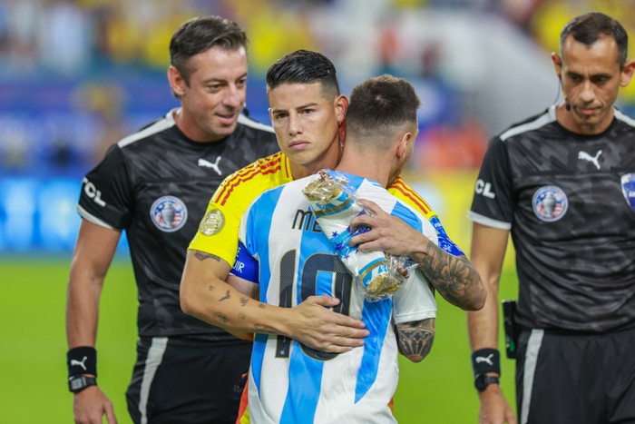 James Rodriguez, Lionel Messi MIAMI GARDENS, FLORIDA - JULY 14: James Rodriguez #10 of Colombia and Lionel Messi #10 of Argentina hug before the match between Colombia and Argentina at Hard Rock Stadium on July 14, 2024 in Miami Gardens, FL. (Photo by Roger Wimmer/ISI Photos/Getty Images)