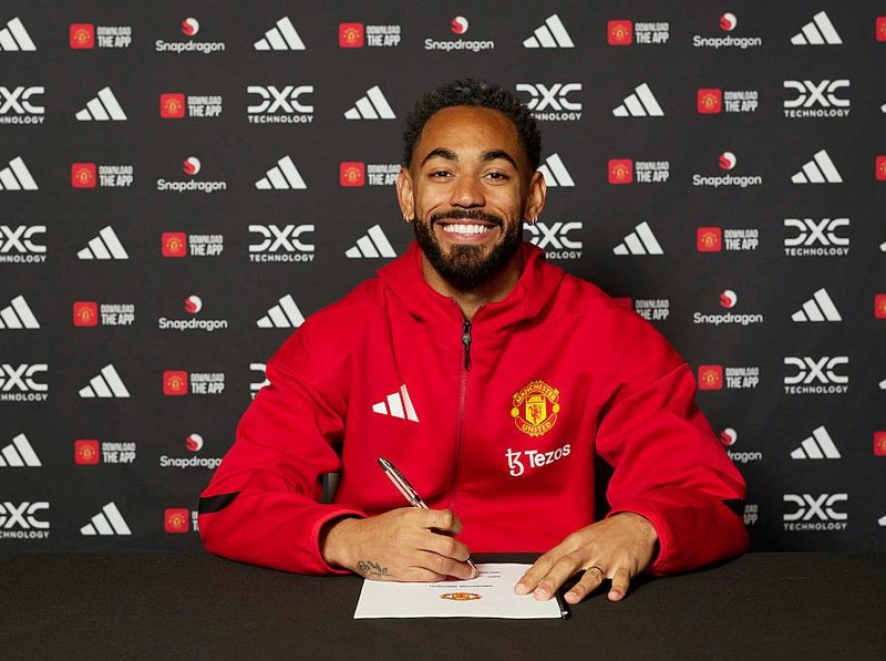 MANCHESTER, ENGLAND - JUNE 12: (EXCLUSIVE COVERAGE) Matheus Cunha of Manchester United signing his contract with the club at Carrington Training Ground on June 12, 2025 in Manchester, England. (Photo by Manchester United/Manchester United via Getty Images)