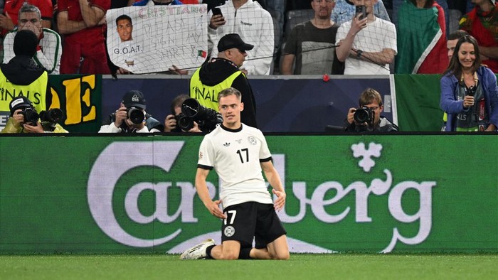 Florian Wirtz Soccer Football - Nations League - Semi Final - Germany v Portugal - Allianz Arena, Munich, Germany - June 4, 2025 Germanys Florian Wirtz celebrates scoring their first goal REUTERS/Angelika Warmuth
