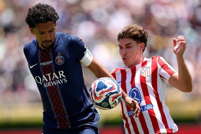 PSG, Paris Saint-Germain PASADENA, CALIFORNIA - JUNE 15: Marquinhos #5 of Paris Saint-Germain is challenged by Julian Alvarez #19 of Atletico De Madrid during the FIFA Club World Cup 2025 group B match between Paris Saint-Germain FC and Club Atletico de Madrid at Rose Bowl Stadium on June 15, 2025 in Pasadena, California. (Photo by Sean M. Haffey - FIFA/FIFA via Getty Images)