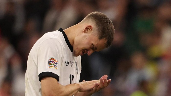 Florian Wirtz Soccer Football - Nations League - Semi Final - Germany v Portugal - Allianz Arena, Munich, Germany - June 4, 2025 Germanys Florian Wirtz looks dejected after the match REUTERS/Michaela Stache