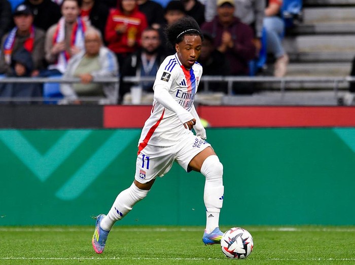 LYON, FRANCE - MAY 4: Malick Fofana of Olympique Lyon runs with the ball during the France Ligue 1 match between Olympique Lyonnais and Racing Club de Lens at Groupama Stadium on May 4, 2025 in Lyon, France. (Photo by Eurasia Sport Images/Getty Images)