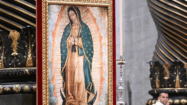 An icon of the virgin Mary of Guadalupe is pictured during a mass for the Feast of Our Lady of Guadalupe at St Peters basilica in The Vatican, on December 12, 2024 (Photo by Tiziana FABI / AFP)
