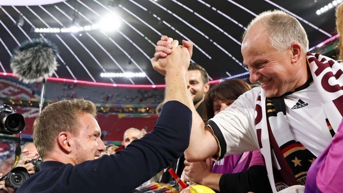 Hans Wirtz MUNICH, GERMANY - JUNE 14: Julian Nagelsmann Head coach of Germany celebrate with Hans Wirtz father of Florian Wirtz of Germany after their sides victory the UEFA EURO 2024 group stage match between Germany and Scotland at Munich Football Arena on June 14, 2024 in Munich, Germany. (Photo by Stefan Matzke - sampics/Getty Images)