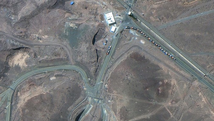 A satellite image shows trucks positioned near the entrance of the Fordow fuel enrichment facility, near Qom, Iran June 19, 2025. Maxar Technologies/Handout via REUTERSTHIS IMAGE HAS BEEN SUPPLIED BY A THIRD PARTY. NO RESALES. NO ARCHIVES. MANDATORY CREDIT. MUST NOT OBSCURE LOGO