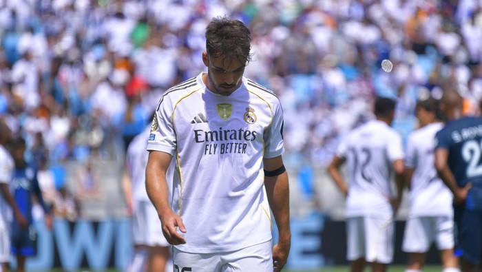 CHARLOTTE, NORTH CAROLINA - JUNE 22: Raul Asencio of Real Madrid leaves the pitch after receiving a red card during the FIFA Club World Cup 2025 group H match between Real Madrid CF and CF Pachuca at Bank of America Stadium on June 22, 2025 in Charlotte, North Carolina. (Photo by Oscar Fuentes/Jam Media/Getty Images)