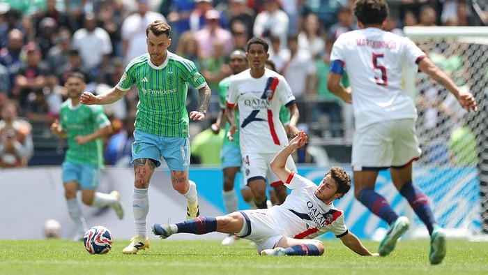 SEATTLE, WASHINGTON - JUNE 23: Albert Rusnak #11 of Seattle Sounders FC is challenged by Joao Neves #87 of Paris Saint-Germain during the FIFA Club World Cup 2025 group B match between Seattle Sounders FC and Paris Saint-Germain FC at Lumen Field on June 23, 2025 in Seattle, Washington. (Photo by Steph Chambers - FIFA/FIFA via Getty Images)