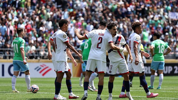 SEATTLE, WASHINGTON - JUNE 23: Achraf Hakimi #2 of Paris Saint-Germain celebrates scoring his teams second goal with Vitinha #17 during the FIFA Club World Cup 2025 group B match between Seattle Sounders FC and Paris Saint-Germain FC at Lumen Field on June 23, 2025 in Seattle, Washington. (Photo by Buda Mendes/Getty Images)