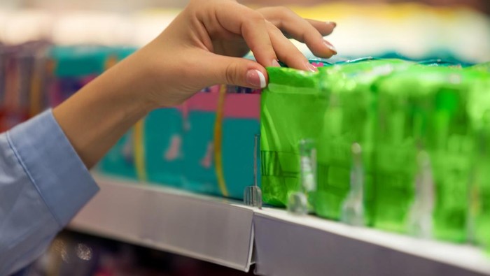 Woman choosing sanitary pad