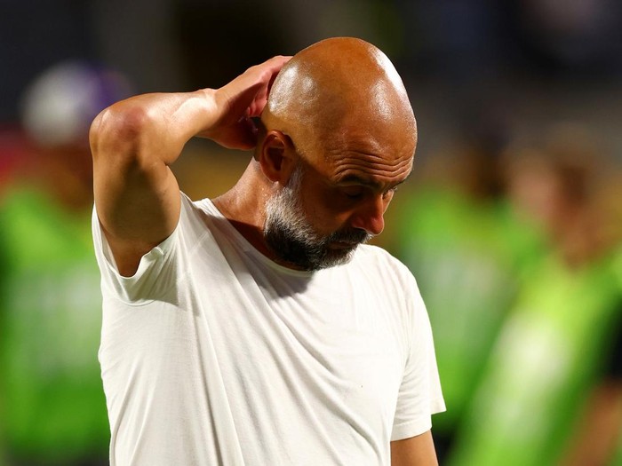 ORLANDO, FLORIDA - JUNE 30: Manchester City manager Josep Guardiola reacts at full-time following the FIFA Club World Cup 2025 round of 16 match between Manchester City and Al-Hilal at Camping World Stadium on June 30, 2025 in Orlando, Florida. (Photo by Chris Brunskill/Fantasista/Getty Images)