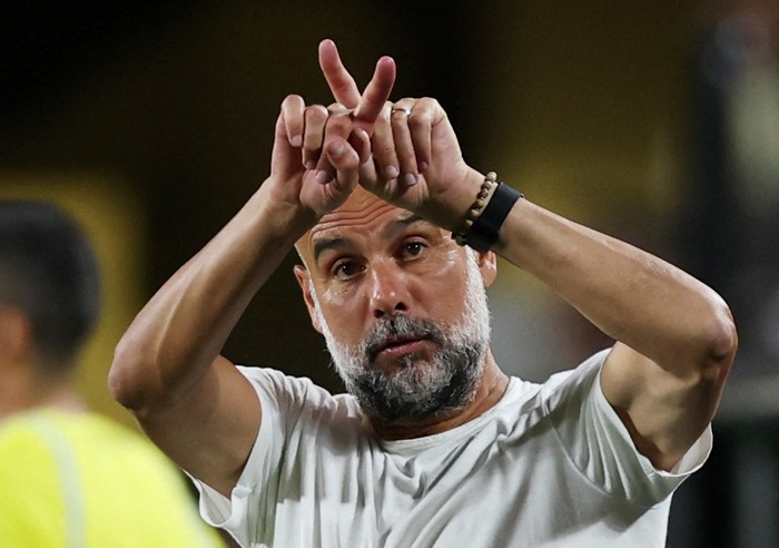 Soccer Football - FIFA Club World Cup - Round of 16 - Manchester City v Al Hilal - Camping World Stadium, Orlando, Florida, U.S. - June 30, 2025 Manchester City manager Pep Guardiola reacts at full time before extra time REUTERS/Lee Smith