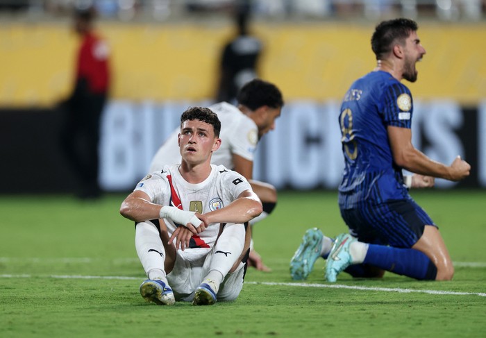 Phil Foden Soccer Football - FIFA Club World Cup - Round of 16 - Manchester City v Al Hilal - Camping World Stadium, Orlando, Florida, U.S. - June 30, 2025 Manchester Citys Phil Foden looks dejected after the match REUTERS/Lee Smith