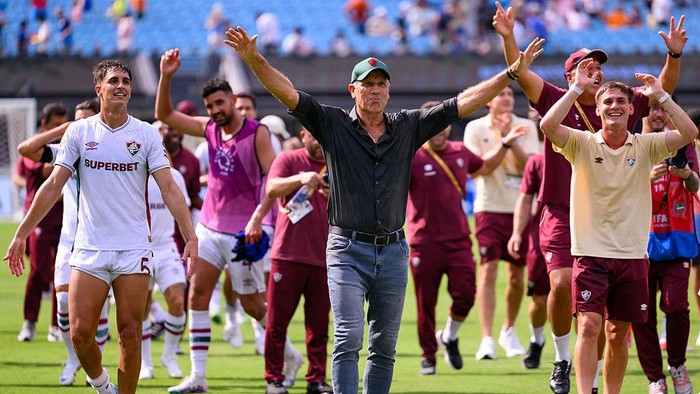 Renato Gaucho CHARLOTTE, NORTH CAROLINA - JUNE 30: Fluminense FC Head Coach Renato Portaluppi celebrates with players their victory over Internazionale following the FIFA Club World Cup 2025 round of 16 match between FC Internazionale Milano and Fluminense FC at Bank of America Stadium on June 30, 2025 in Charlotte, North Carolina. (Photo by Marcio Machado/Eurasia Sport Images/Getty Images)