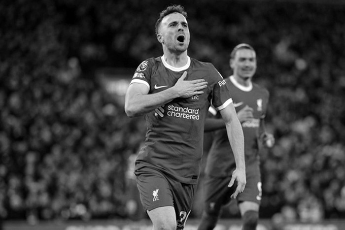 Britain Soccer Premier League Liverpools Diogo Jota celebrates after scoring his sides first goal during the English Premier League soccer match between Liverpool and Chelsea, at Anfield Stadium, Liverpool, England, Wednesday, Jan.31, 2024. (AP Photo/Jon Super)