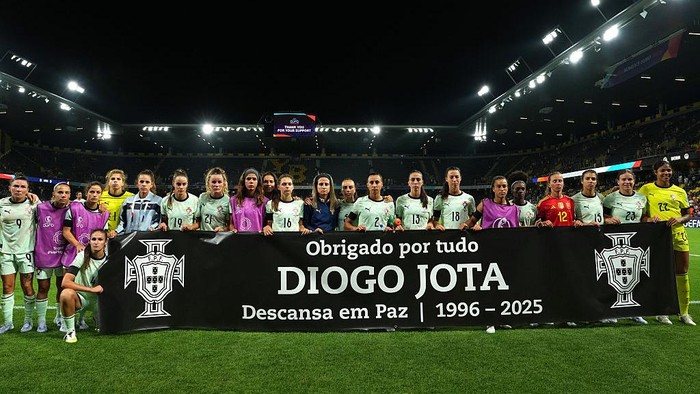 2223454617 BERN, SWITZERLAND - JULY 03: Players of Portugal hold up a banner which reads