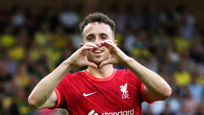 FILE PHOTO: Soccer Football - Premier League - Norwich City v Liverpool - Carrow Road, Norwich, Britain - August 14, 2021 Liverpool's Diogo Jota celebrates scoring their first goal REUTERS/Chris Radburn/File Photo   EDITORIAL USE ONLY. No use with unauthorized audio, video, data, fixture lists, club/league logos or 'live' services. Online in-match use limited to 75 images, no video emulation. No use in betting, games or single club /league/player publications.  Please contact your account representative for further details.