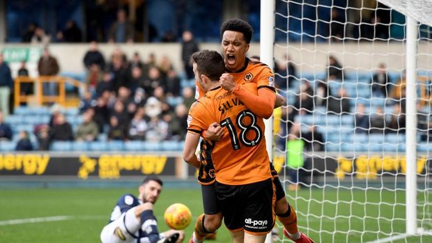 LONDON, ENGLAND - DECEMBER 26: Diogo Jota of Wolverhampton Wanderers celebrates after scoring a goal to make it 1-1 with Helder Costa during the Sky Bet Championship match between Millwall and Wolverhampton at The Den on December 26, 2017 in London, England. (Photo by Sam Bagnall - AMA/Getty Images)