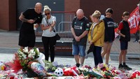 Manajemen klub turut mengucapkan duka mendalam dan menyampaikan rasa terima kasih kepada semua pihak yang hadir memberi penghormatan, menegaskan bahwa Jota akan selalu menjadi bagian dari sejarah Liverpool. REUTERS/Temilade Adelaja