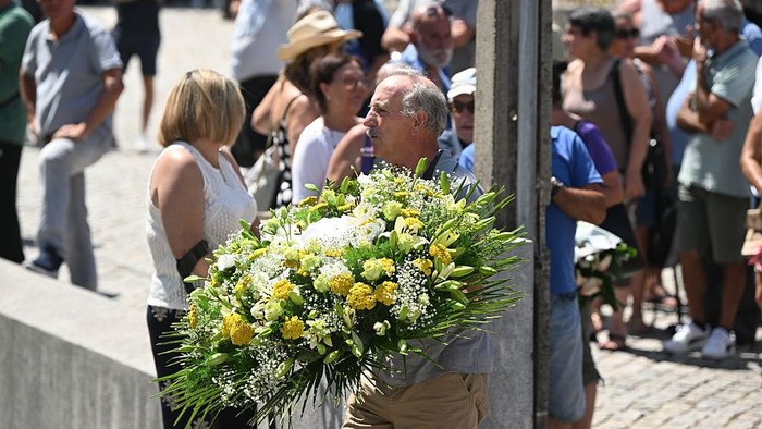 PORTO, PORTUGAL - JULY 04: Locals and family members arrive to pay their respects at the wake of Diogo Jota being held at Sao Cosme Chapel in the town of Gondomar on Friday 4 July 2025 in Porto, Portugal. The Portugal forward died along with his younger brother Andre Silva in the accident in Zamora on Thursday morning. (Photo by Alex Juarez/Anadolu via Getty Images)