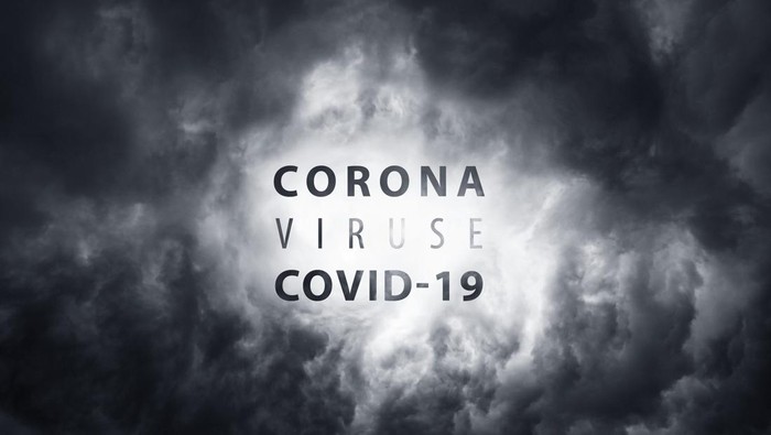 Warning about the scary COVID-19 virus. World pandemic with coronavirus COVID19. Wuhan city is a threat to humanity. Bacteria on a background of thunderclouds