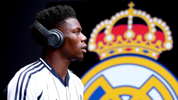 MIAMI GARDENS, FLORIDA - JUNE 18: Aurelien Tchouameni #14 of Real Madrid C.F. inspects the pitch prior to the FIFA Club World Cup 2025 group H match between Real Madrid CF and Al Hilal at Hard Rock Stadium on June 18, 2025 in Miami Gardens, Florida. (Photo by Rich Storry - FIFA/FIFA via Getty Images)