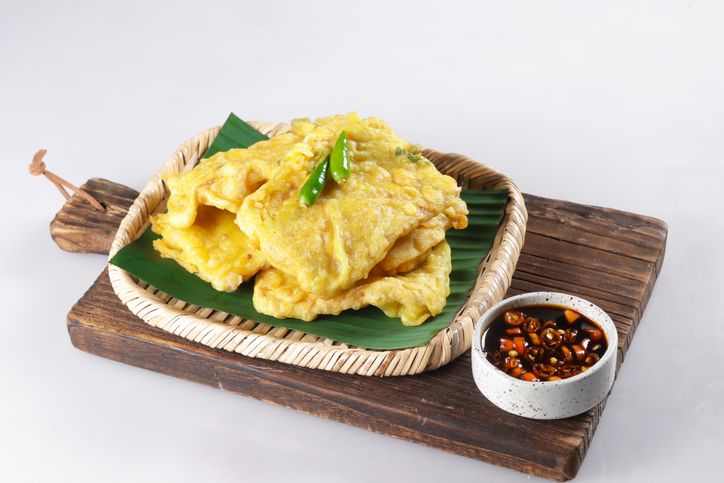 Tempe Goreng or Tempe Mendoan is Indonesian traditional food made from tempeh covered in flour batter.