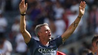 Pelatih PSG Luis Enrique memuji rekan setimnya: “Ini adalah musim yang luar biasa dan performa sempurna melawan Real Madrid,” katanya usai laga. (REUTERS/Mike Segar)  