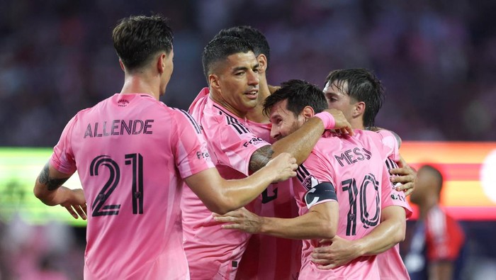 Jul 9, 2025; Foxborough, Massachusetts, USA; Inter Miami CF forward Luis Suarez (9) and Inter Miami CF forward Lionel Messi (10) celebrate after a goal during the first half against the New England Revolution at Gillette Stadium. Mandatory Credit: Paul Rutherford-Imagn Images