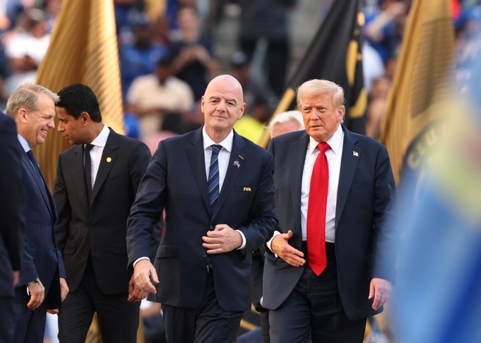 Soccer Football - FIFA Club World Cup - Final - Chelsea v Paris St Germain - MetLife Stadium, East Rutherford, New Jersey, U.S. - July 13, 2025 U.S. President Donald Trump and FIFA president Gianni Infantino during the trophy presentation ceremony IMAGN IMAGES via Reuters/Vincent Carchietta
