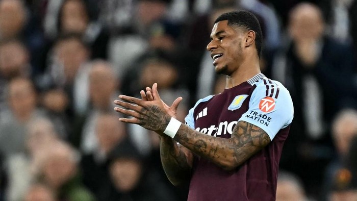 Aston Villas English striker #09 Marcus Rashford reacts after failing to score during the UEFA Champions League quarter-final second-leg football match between Aston Villa and Paris Saint-Germain at Villa Park in Birmingham, central England on April 15, 2025. (Photo by Paul ELLIS / AFP)