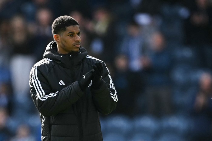 Aston Villa's English striker #09 Marcus Rashford applauds as he celebrates at the end of the English FA Cup quarter-final football match between Preston North End and Aston Villa at Deepdale stadium in Preston, north-west England on March 30, 2025. Aston Villa wins 3 - 0 against Preston North End. (Photo by Paul ELLIS / AFP) / RESTRICTED TO EDITORIAL USE. No use with unauthorized audio, video, data, fixture lists, club/league logos or 'live' services. Online in-match use limited to 120 images. An additional 40 images may be used in extra time. No video emulation. Social media in-match use limited to 120 images. An additional 40 images may be used in extra time. No use in betting publications, games or single club/league/player publications. /