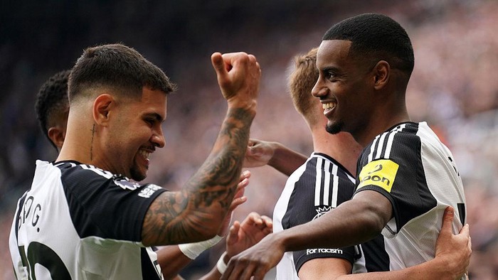 Newcastle Uniteds Alexander Isak (right) celebrates with team-mates after scoring their sides first goal of the game from the penalty spot during the Premier League match at St James Park, Newcastle. Picture date: Saturday April 26, 2025. (Photo by Owen Humphreys/PA Images via Getty Images)