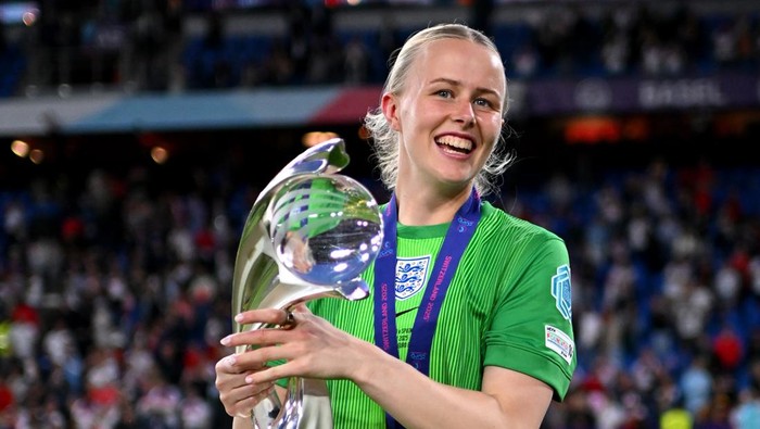 BASEL, SWITZERLAND - JULY 27: Hannah Hampton of England celebrates with the UEFA Womens EURO trophy following the teams victory in the UEFA Womens EURO 2025 Final match between England and Spain at St. Jakob-Park on July 27, 2025 in Basel, Switzerland. (Photo by Harriet Lander - The FA/The FA via Getty Images)