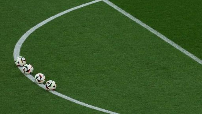 Match balls are set up for warm ups ahead of the UEFA Euro 2024 Group E football match between Ukraine and Belgium at the Stuttgart Arena in Stuttgart on June 26, 2024. (Photo by LLUIS GENE / AFP)