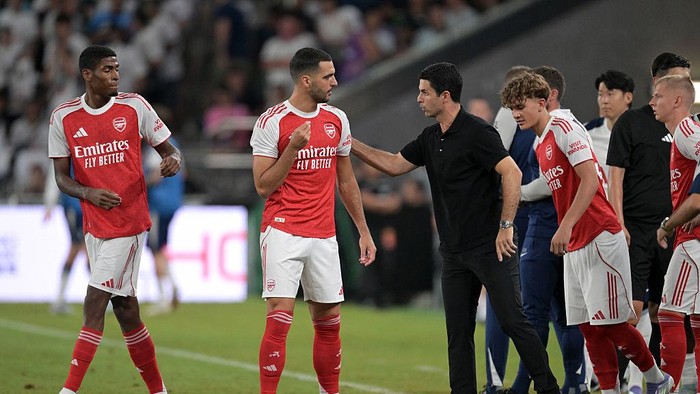 HONG KONG, CHINA - JULY 31: Mikel Arteta, Manager of Arsenal, speaks with Mikel Merino of Arsenal during the Pre-Season Friendly match between Arsenal and Tottenham Hotspur at Kai Tak Sports Park on July 31, 2025 in Hong Kong, China.  (Photo by Stuart MacFarlane/Arsenal FC via Getty Images)