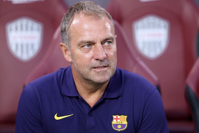 KOBE, JAPAN - JULY 27: FC Barcelonas coach Hansi Flick looks on before the preseason friendly between Vissel Kobe and FC Barcelona at Noevir Stadium Kobe on July 27, 2025 in Kobe, Hyogo, Japan. (Photo by Paul Miller/Getty Images)