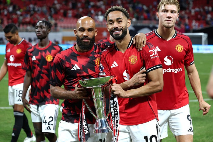 ATLANTA, GEORGIA - AUGUST 03: Bryan Mbeumo and Matheus Cunha of Manchester United celebrate winning the Summer Series league after the Premier League Summer Series match between Manchester United and Everton FC at Mercedes-Benz Stadium on August 03, 2025 in Atlanta, Georgia. (Photo by Kevin C. Cox - Premier League/Getty Images)