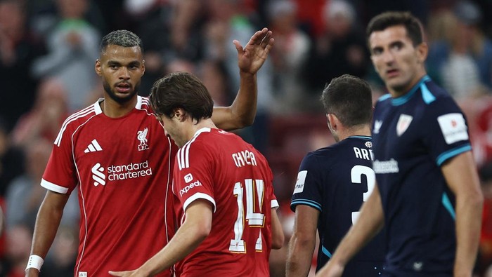 Soccer Football - Friendly - Liverpool v Athletic Bilbao - Anfield, Liverpool, Britain - August 4, 2025 Liverpools Cody Gakpo celebrates scoring their third goal with Federico Chiesa Action Images via Reuters/Lee Smith