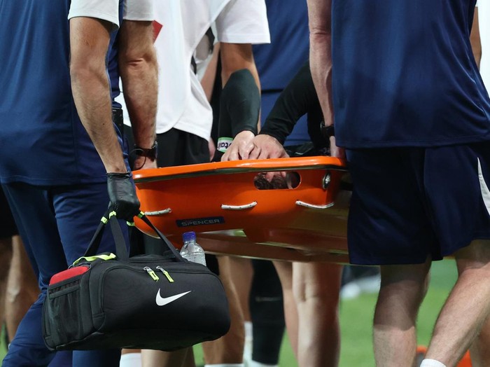 SEOUL, SOUTH KOREA - AUGUST 03: James Maddison of Tottenham Hotspur is stretchered off following an injury during the Pre-Season Friendly match between Tottenham Hotspur and Newcastle United at Seoul World Cup Stadium on August 03, 2025 in Seoul, South Korea. (Photo by Chung Sung-Jun/Getty Images)