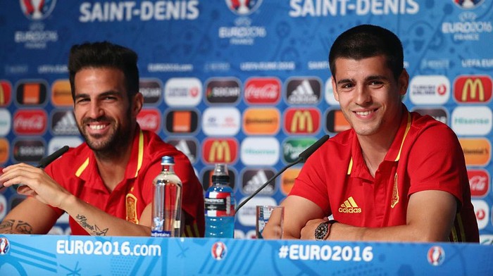 Cesc Fabregas, Alvaro Morata PARIS, FRANCE - JUNE 26: In this handout image provided by UEFA Alvaro Morata and Cesc Fabregas of Spain attend a press conference at Stade de France on June 26, 2016 in Paris, France. (Photo by Handout/UEFA via Getty Images)