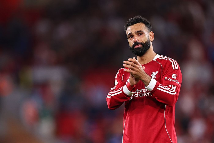 LIVERPOOL, ENGLAND - AUGUST 15: An emotional Mohamed Salah of Liverpool claps along as Liverpool fans in The Top stand sing Diogo Jota's song at full time during the Premier League match between Liverpool and Bournemouth at Anfield on August 15, 2025 in Liverpool, England. (Photo by Robbie Jay Barratt - AMA/Getty Images)