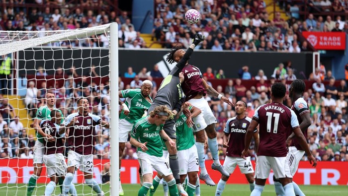 BIRMINGHAM, ENGLAND - AUGUST 16: Marco Bizot of Aston Villa makes a save during the Premier League match between Aston Villa and Newcastle United at Villa Park on August 16, 2025 in Birmingham, England. (Photo by Dan Istitene/Getty Images)