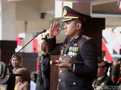 Kapolres Probolinggo Pimpin Penurunan Bendera Merah Putih HUT ke-80 RI